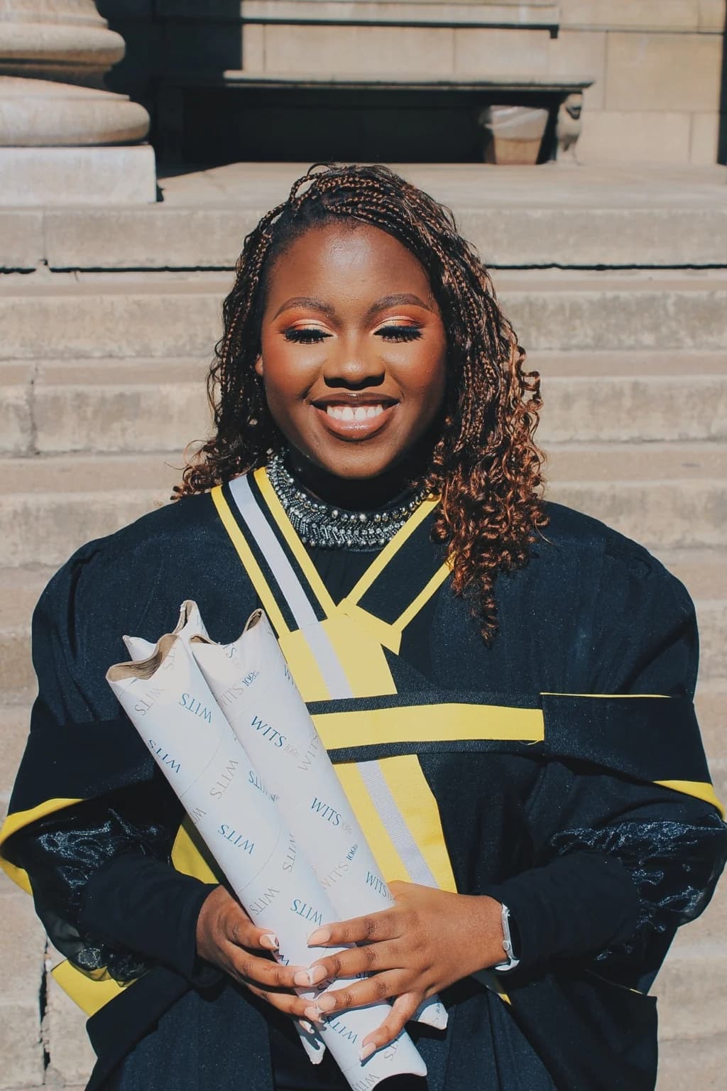 Nqobile Mnisi in Wits University graduation attire